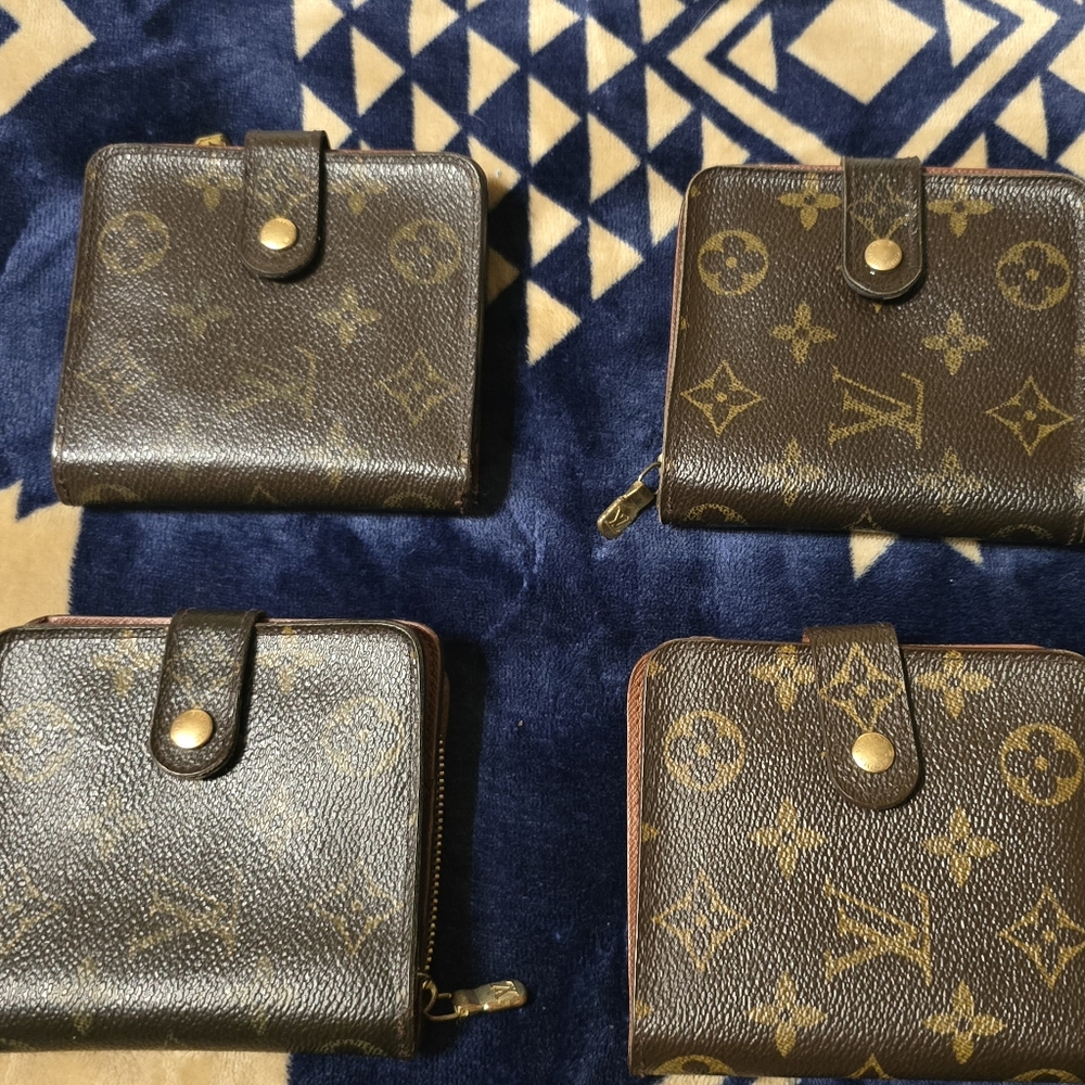 Authentic Louis Vuitton Vintage Brown and Gold Monogram Wallet.